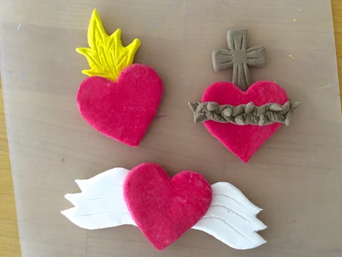 Making Sacred Heart magnets with air dry clay is fun!